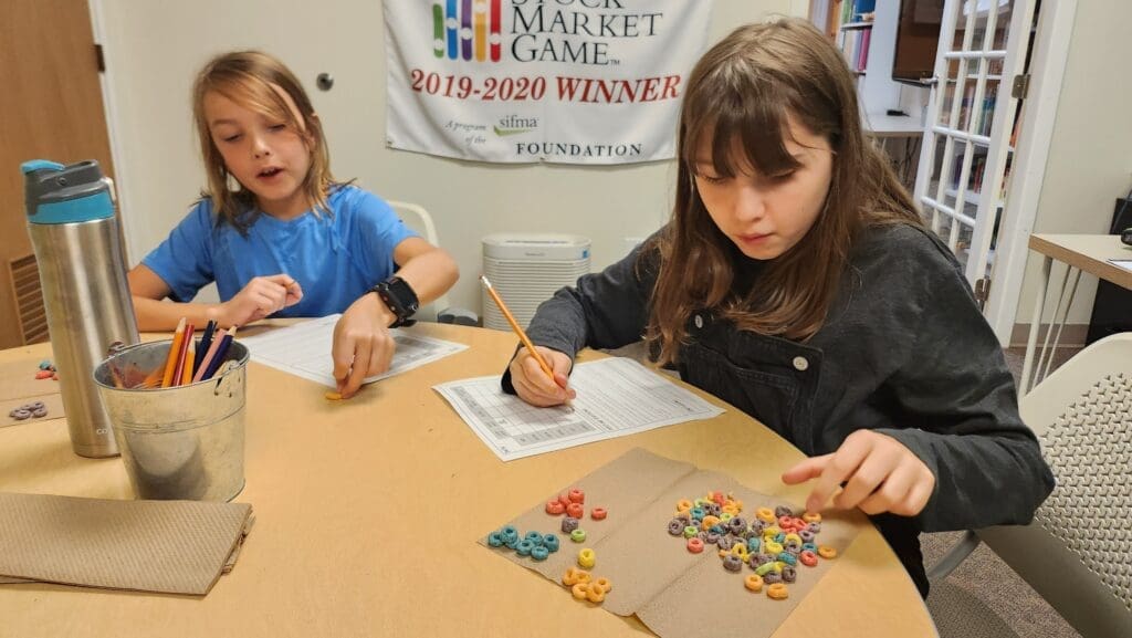 Middle school students use cereal to comprehend math at project based school.