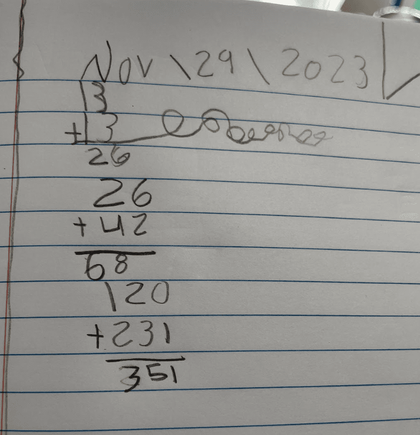 Math work of first grade student at school that supports gifted and talented.
