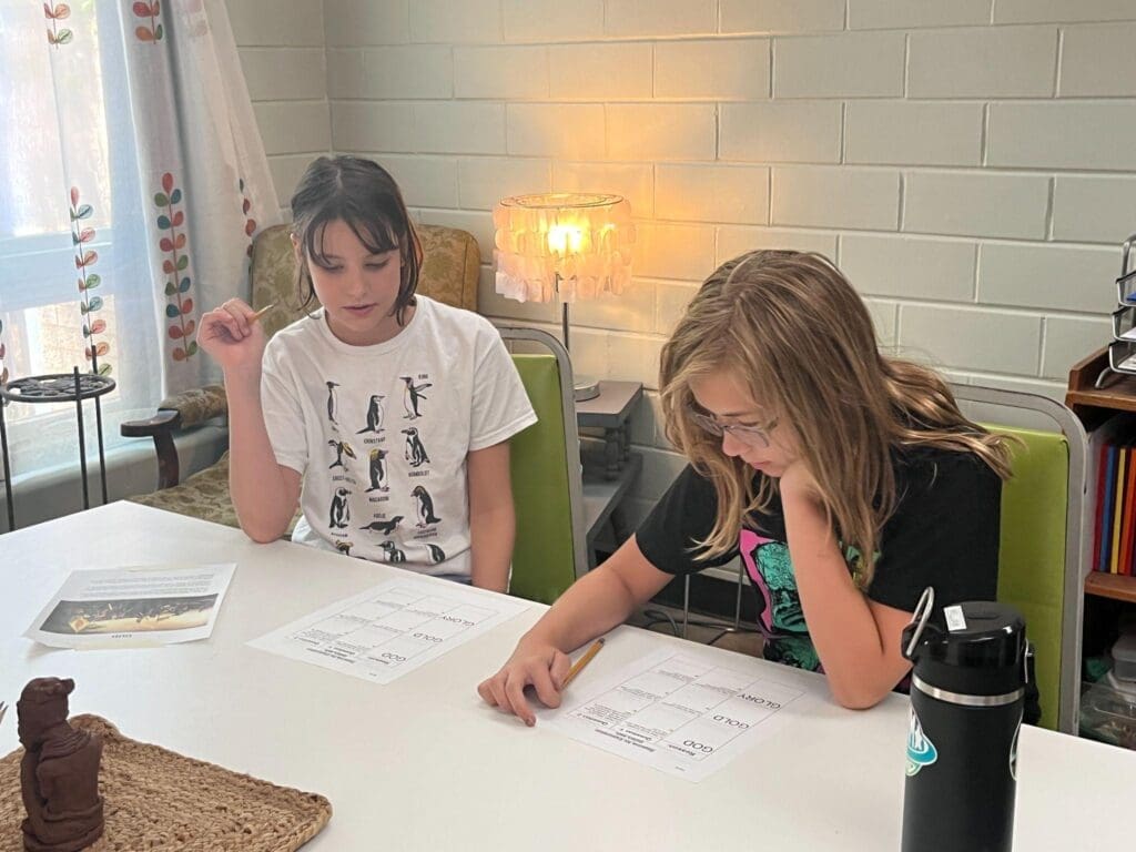 Two fifth grade students work together at micro school in Austin.