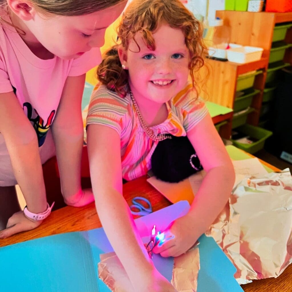 Second grade student works with circuits at project based school in Austin.