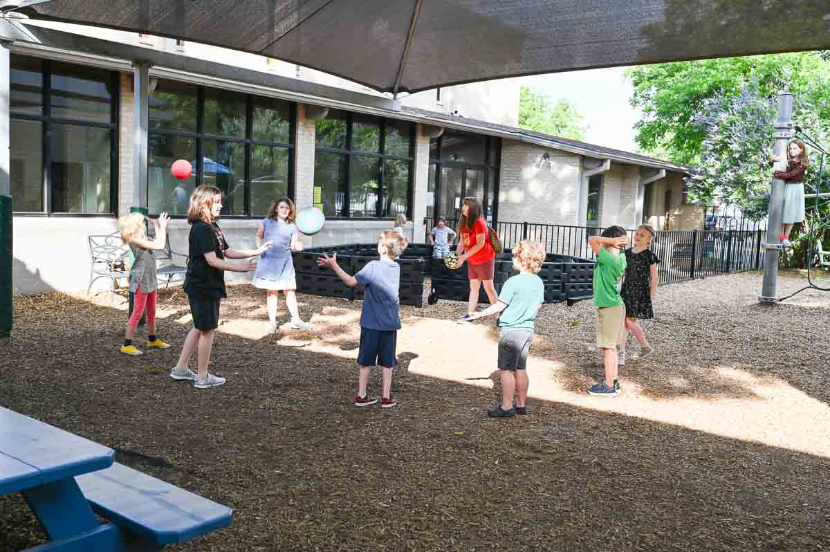 Kids play ball at private school in Austin.
