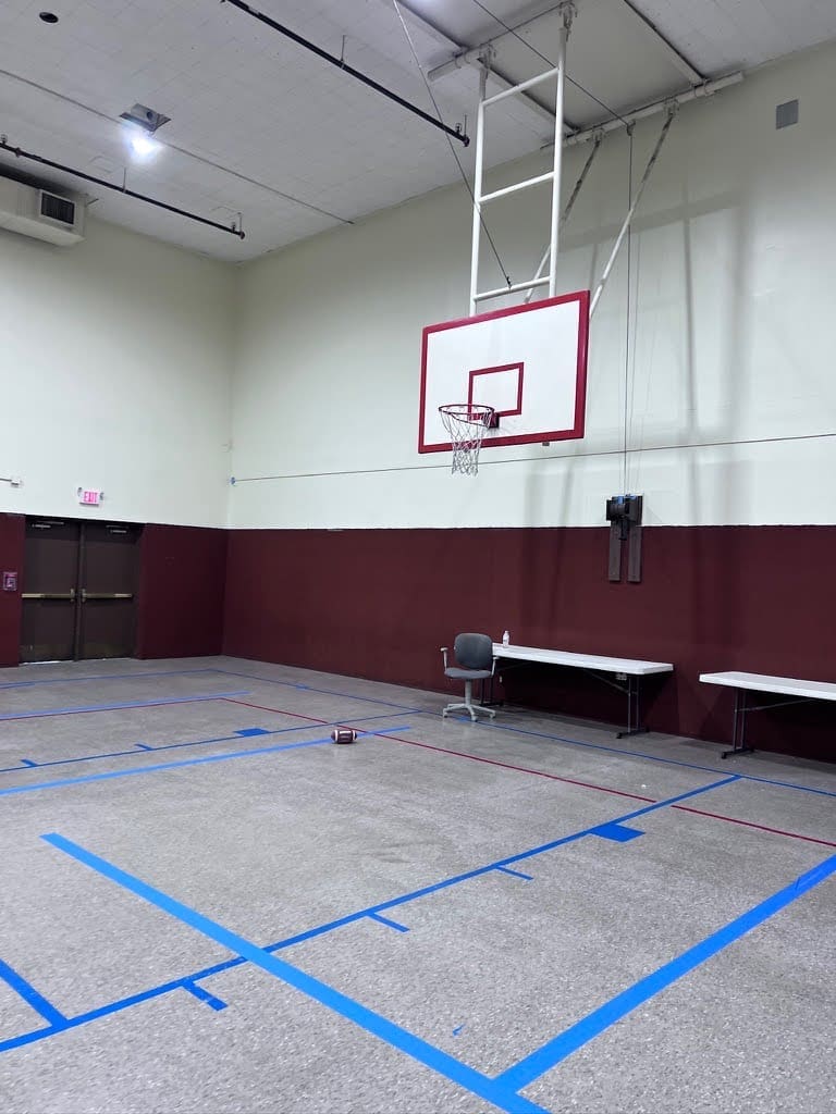 Image of empty gymnasium at new elementary and middle school campus