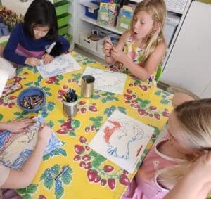 Kindergarten students work together on geography at private school in Austin.